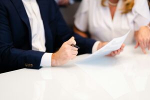 A couple reviewing documents together while preparing for divorce mediation